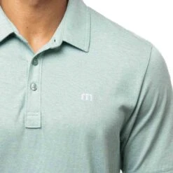 TravisMathew The Zinna Polo 31 TravisMathew The Zinna Polo -EliteGolf Store travismathew 2023 the zinna polo heather bearl green logo itempicture