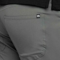 TravisMathew Open To Close Pants 41 TravisMathew Open To Close Pants -EliteGolf Store travismathew open to close pants basalm green logo itempicture