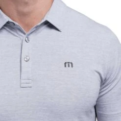 TravisMathew The Heater Polo -EliteGolf Store travismathew the heater polo heather microchip logo itempicture